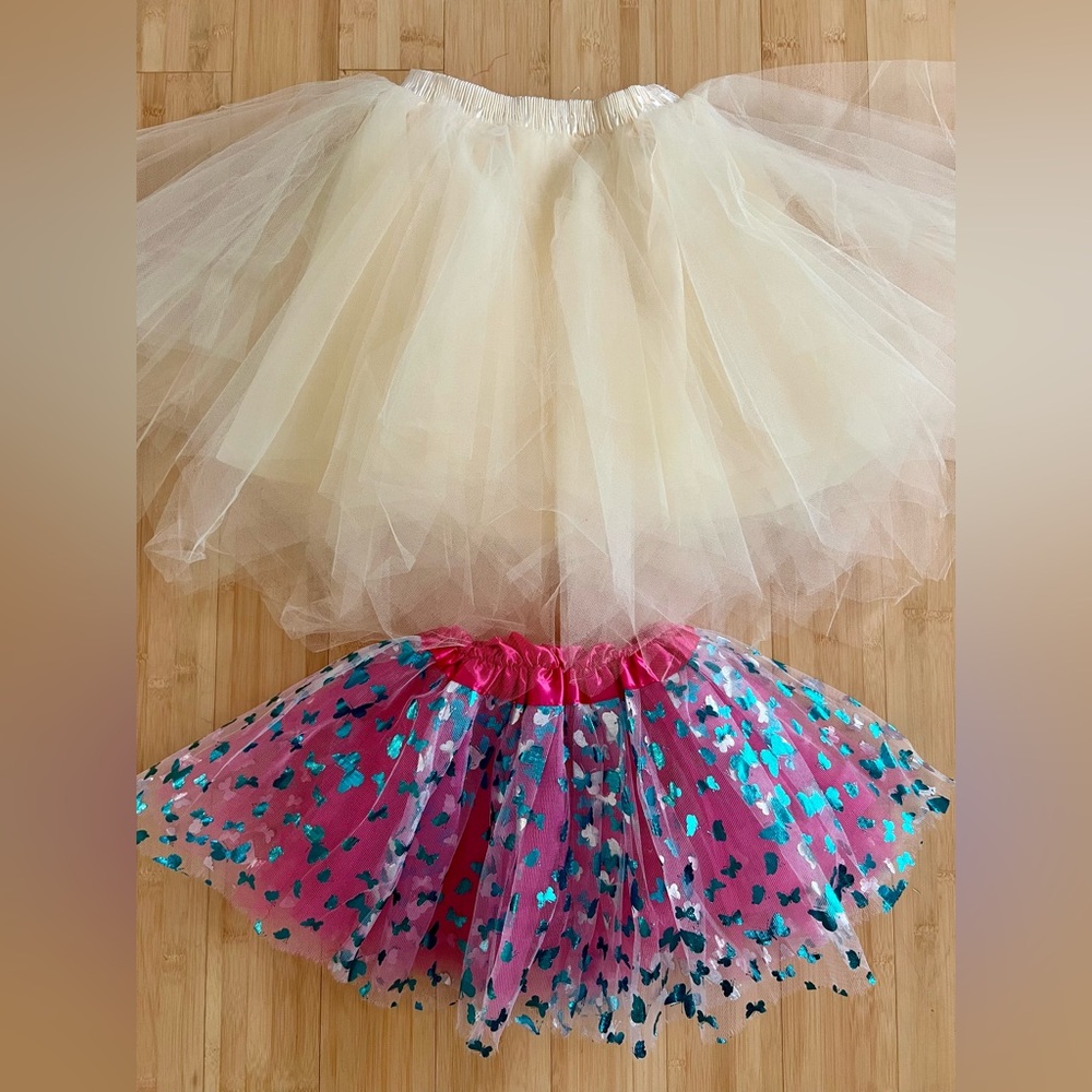 2 Tutus in Excellent Used Condition. Fits ages 3-5 years old.